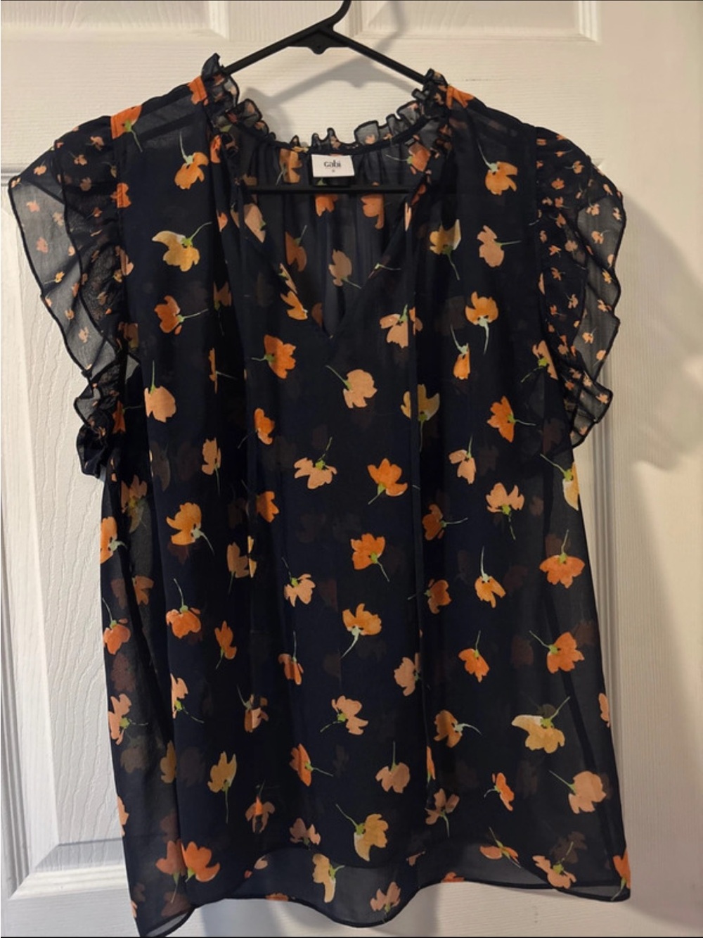 CAbi Black Sheer Flutter Sleeve Floral Blouse with Orange Print